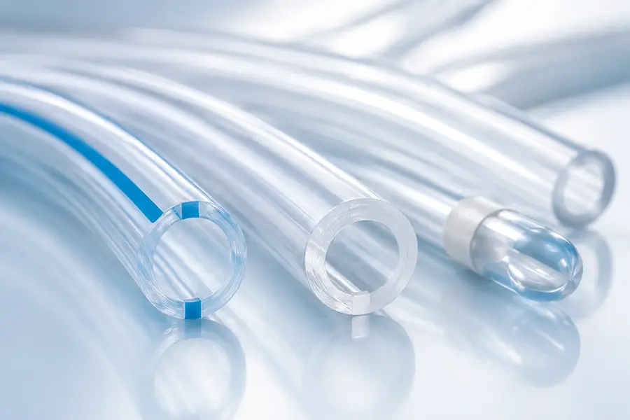 co-extruded catheter tubing with radiopaque stripe
